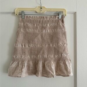 Tan linen skirt! So fun and cute. Never worn, too small for me!